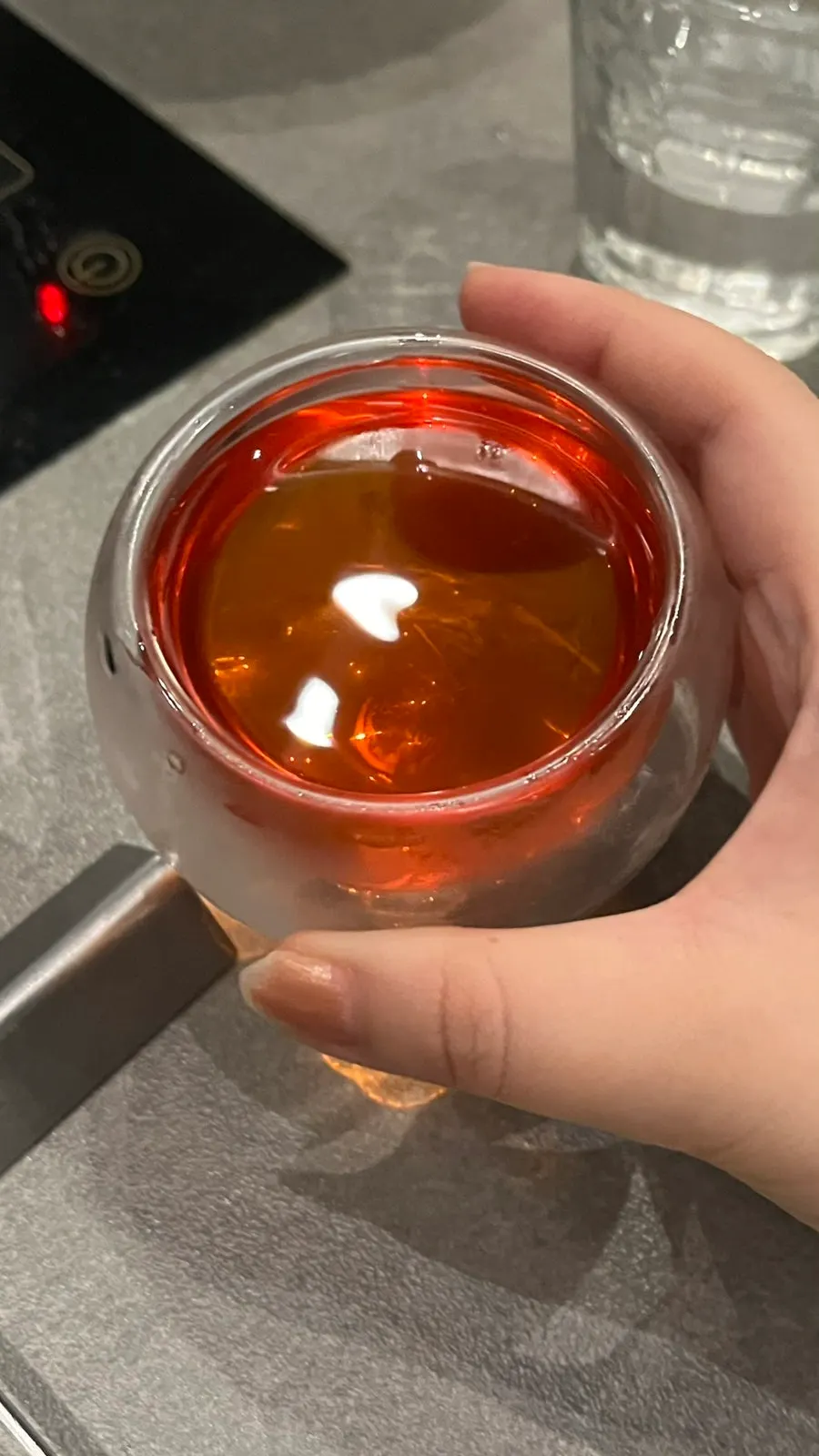 A glass of tangy-sweet omija tea