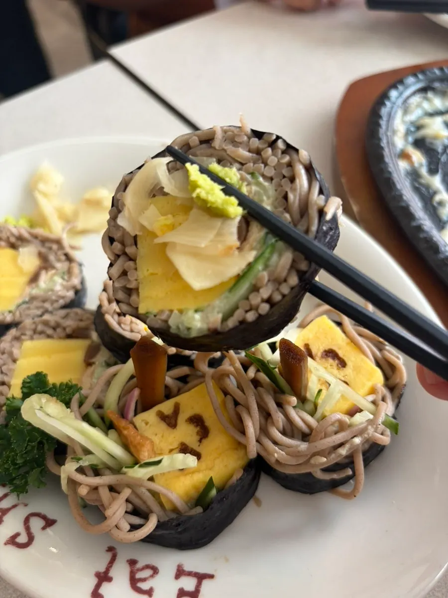 Soba maki served with pickled ginger and cucumber