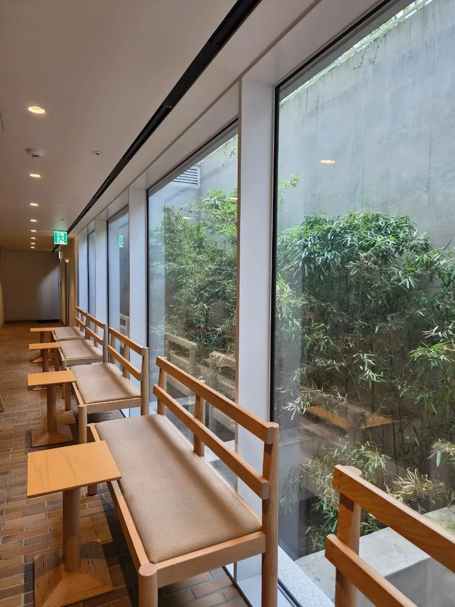 Café seating with wood-toned tables and chairs