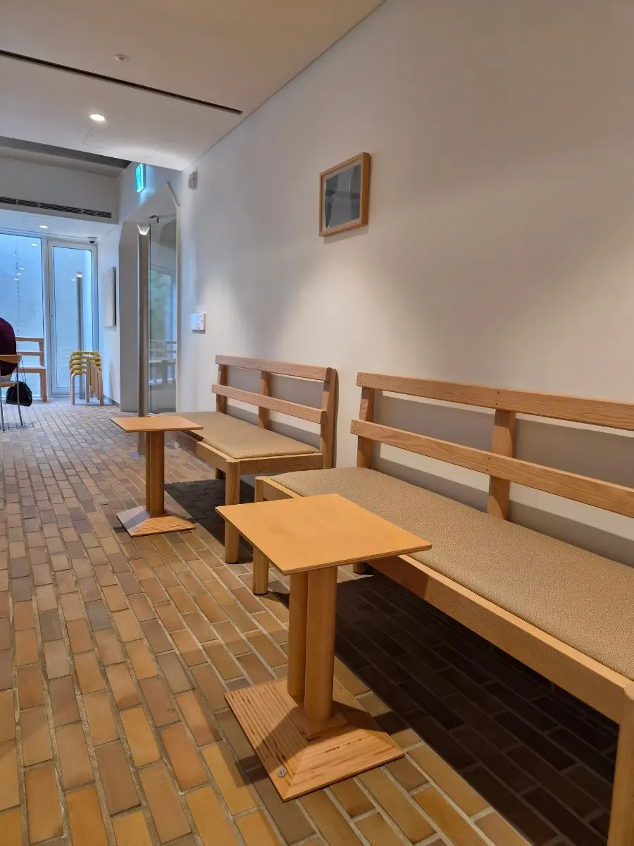 Quiet café seat good for using a laptop or reading