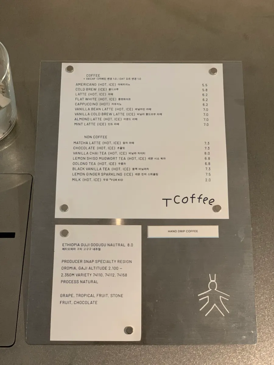 T Coffee's drink menu board