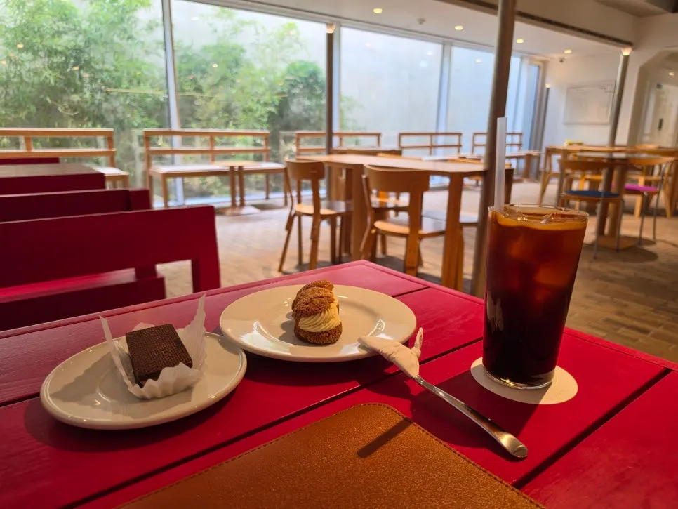 Coffee and dessert on a table at T Coffee in Seongsu