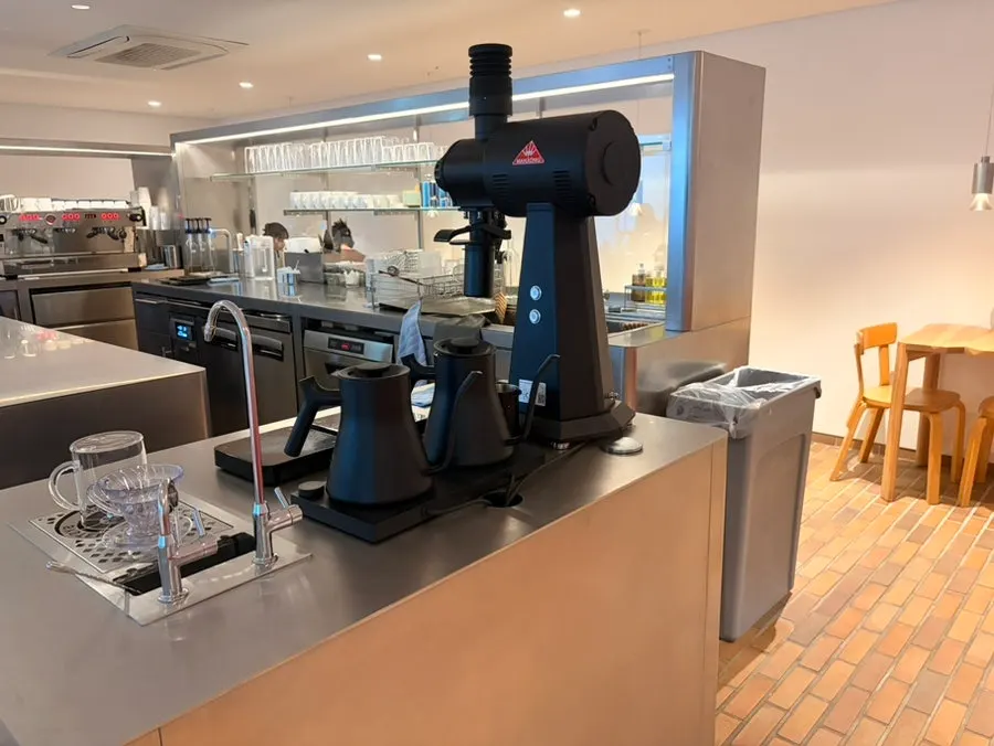Stainless-steel showcase displaying desserts