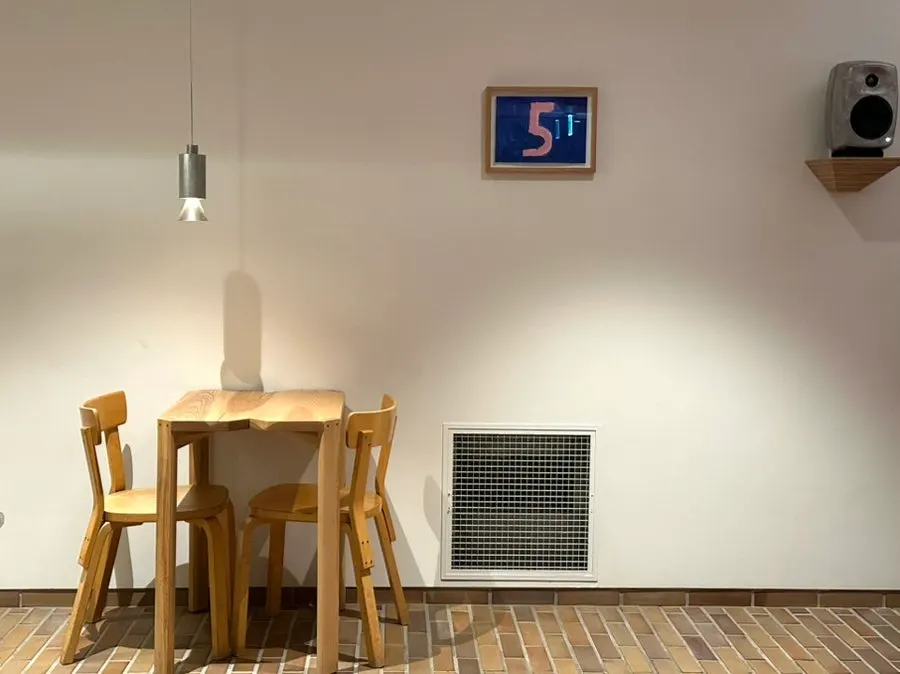Cozy table seats under hanging lights