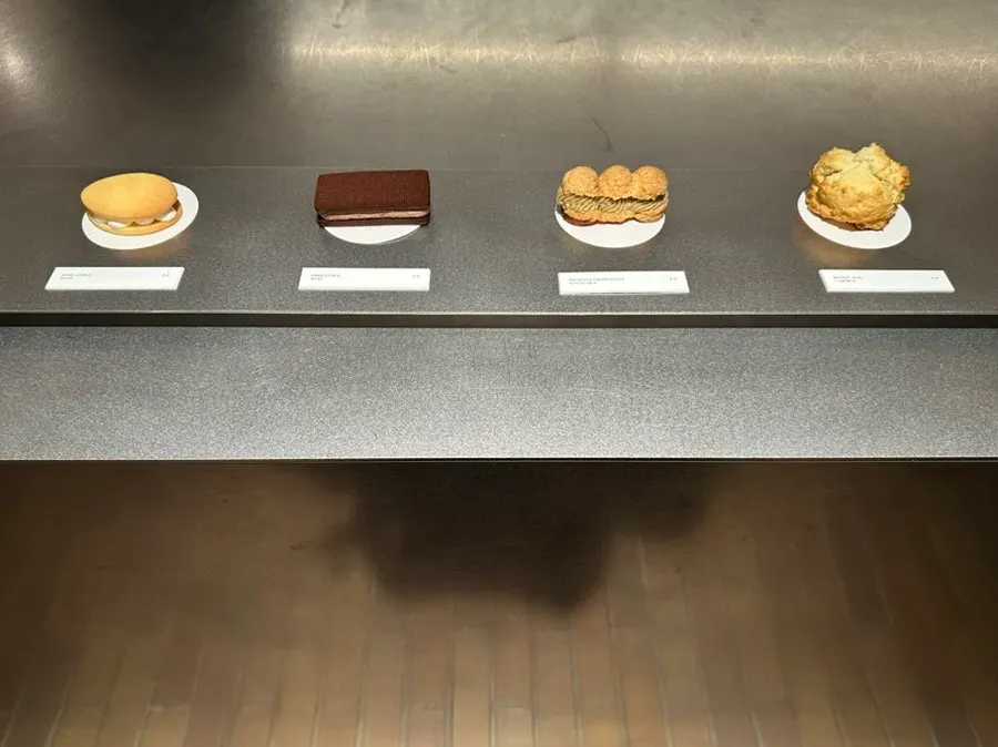 Cakes and baked goods in the dessert display case