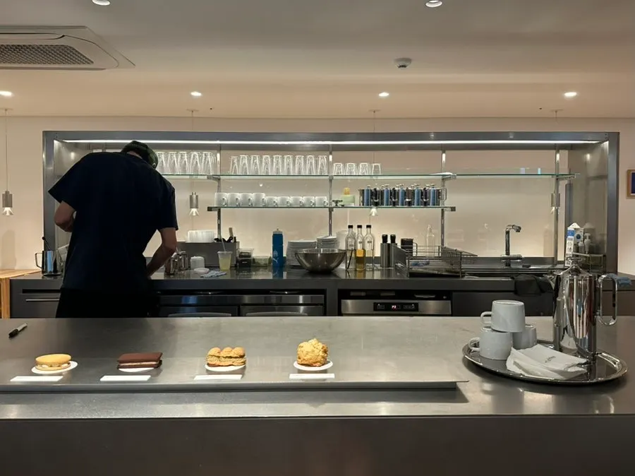 Staff preparing drinks at the open bar