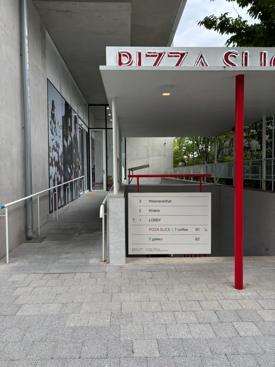 Entrance down to the basement of the building housing T Coffee