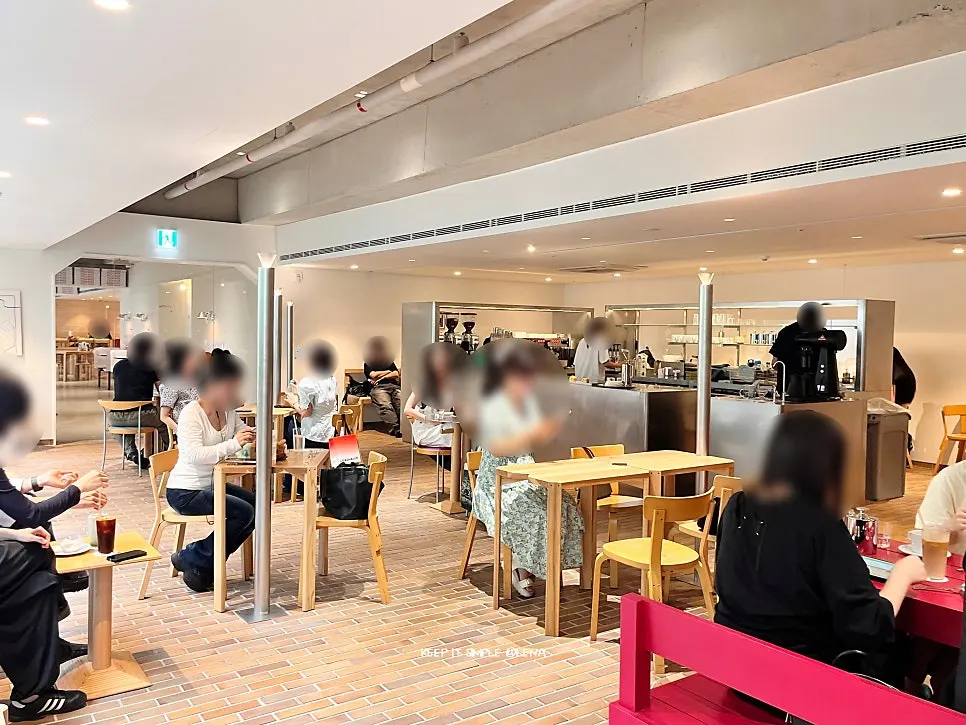 T Coffee's crowded basement interior on a Saturday