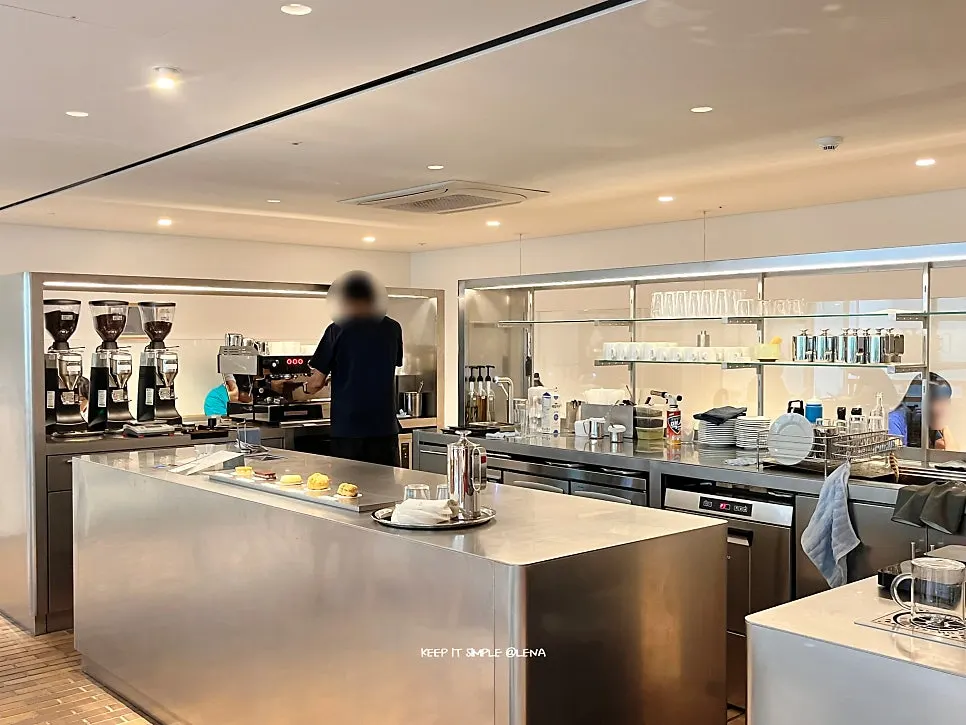 Coffee brewing bar and counter with desserts on display