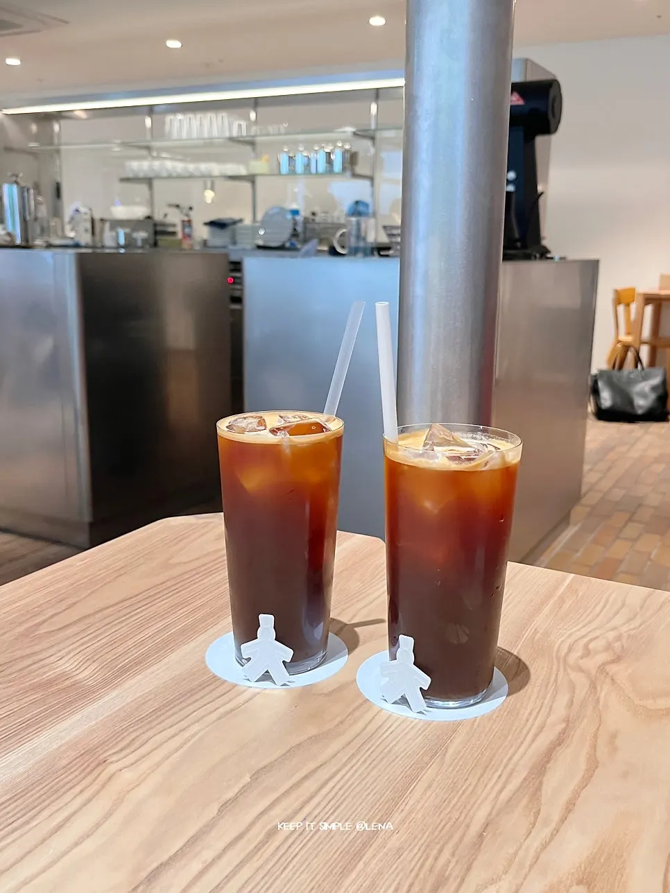 Two iced americanos placed on the table