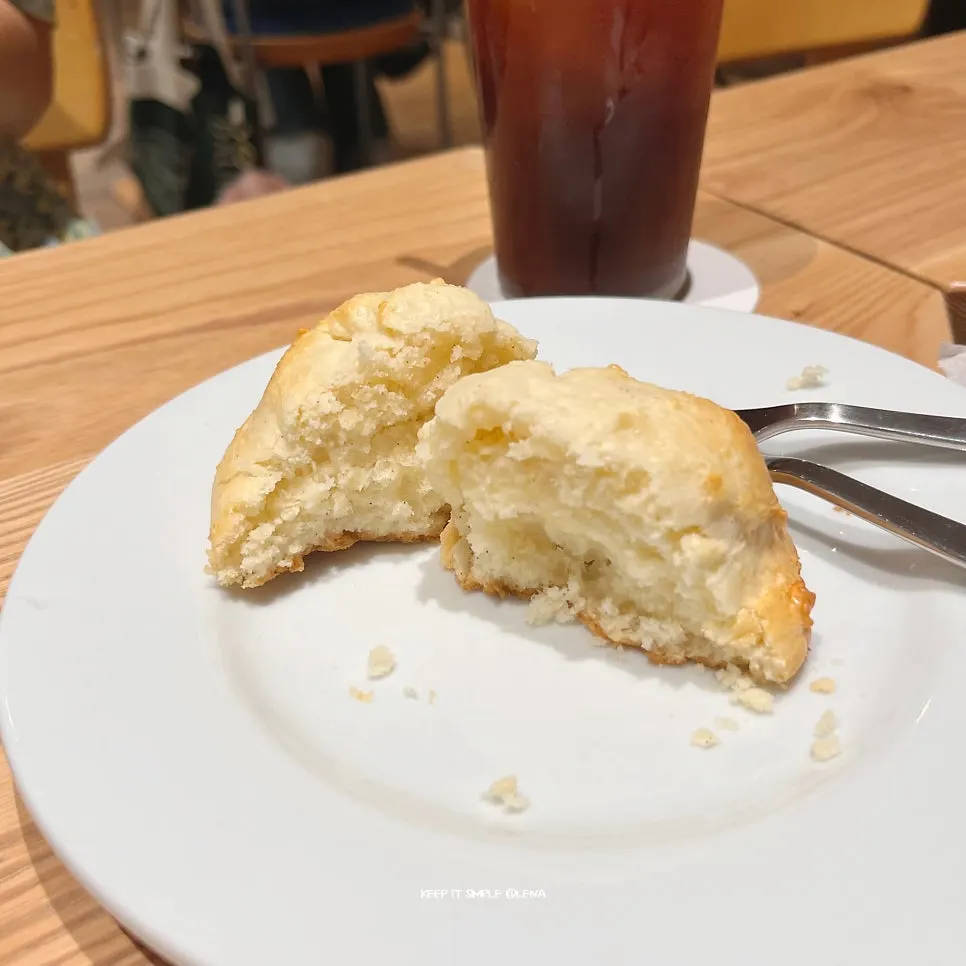 Soft biscuit cut in half with a fork, cross-section visible