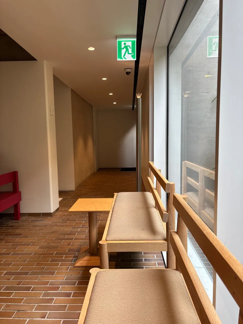 T Coffee tables arranged with generous spacing