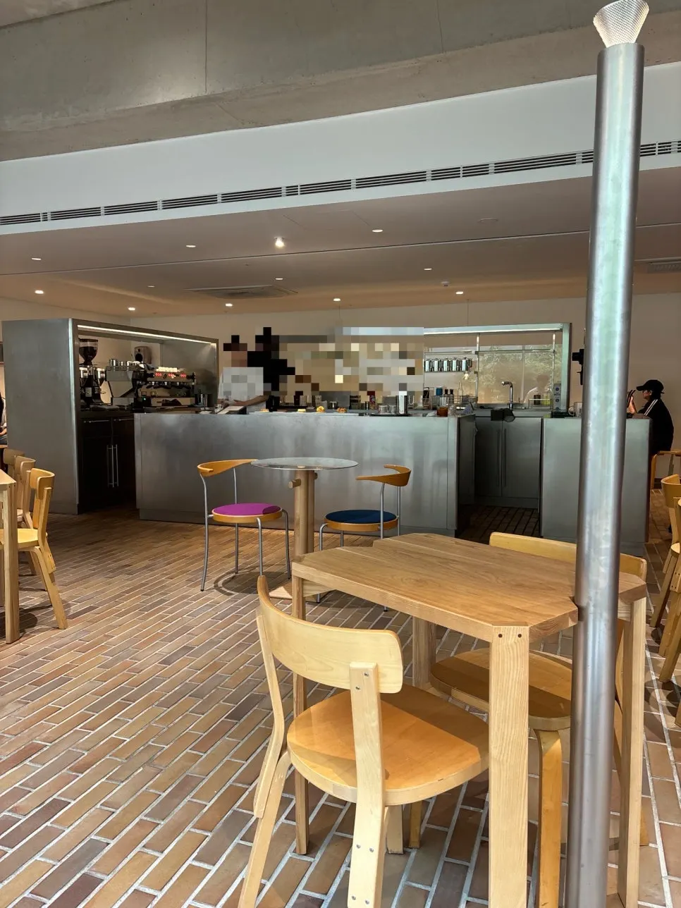 T Coffee interior decorated in wood tones