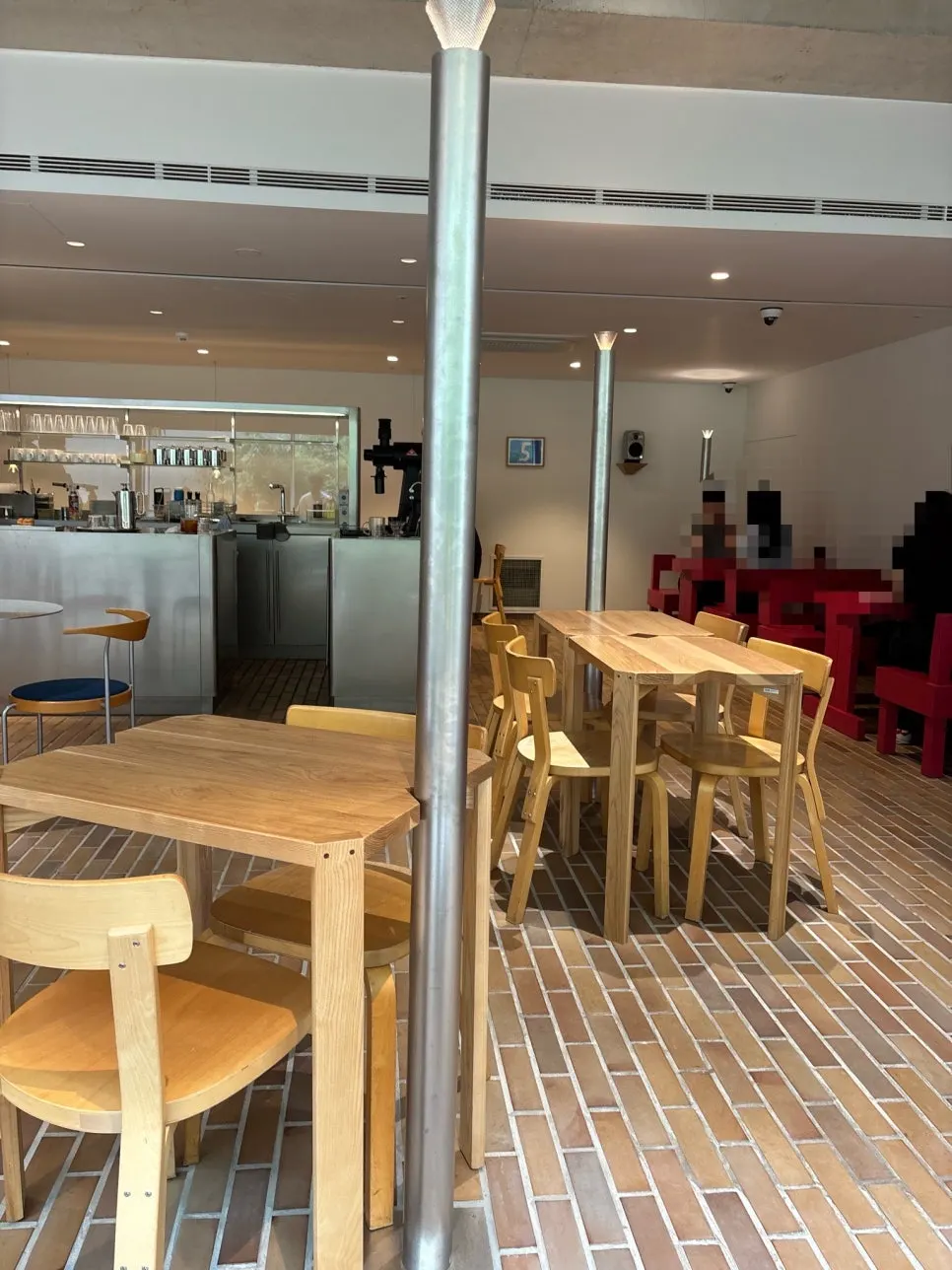 Wood-toned seating area at T Coffee