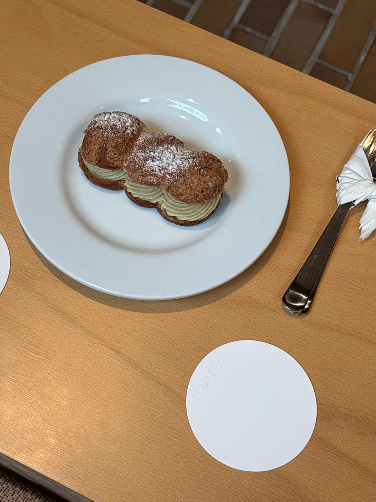 Plate of pistachio choux at T Coffee