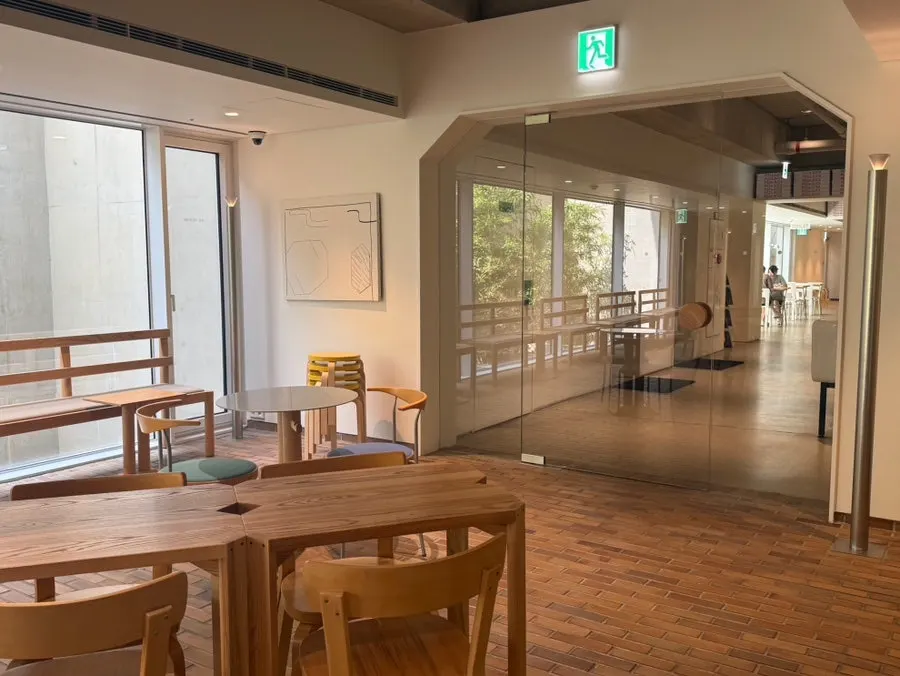 Table seating next to the T Coffee window