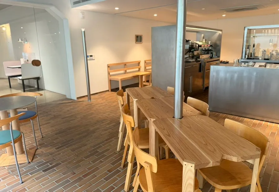 Front seating area facing the floor-to-ceiling windows