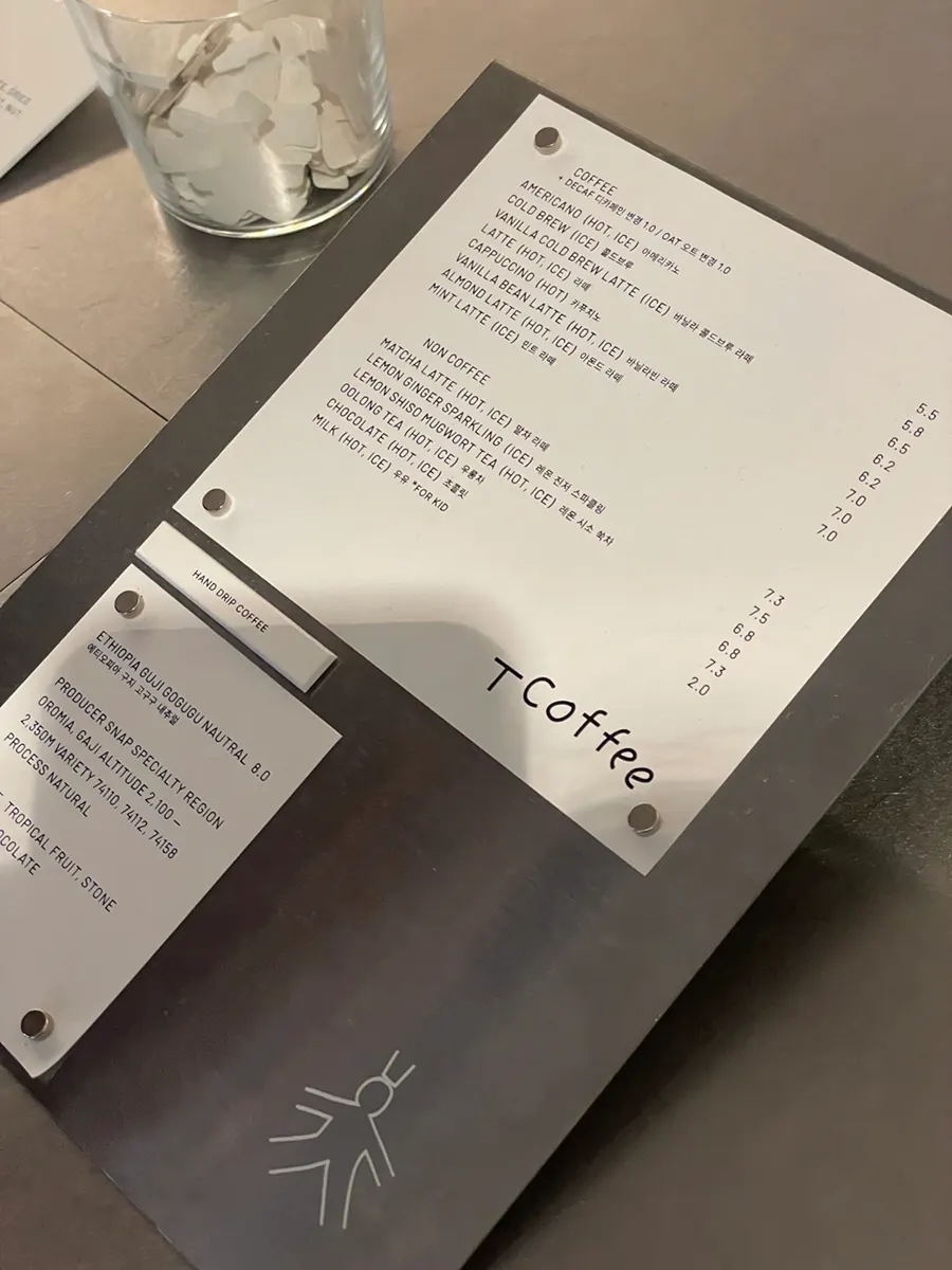 T Coffee's menu board