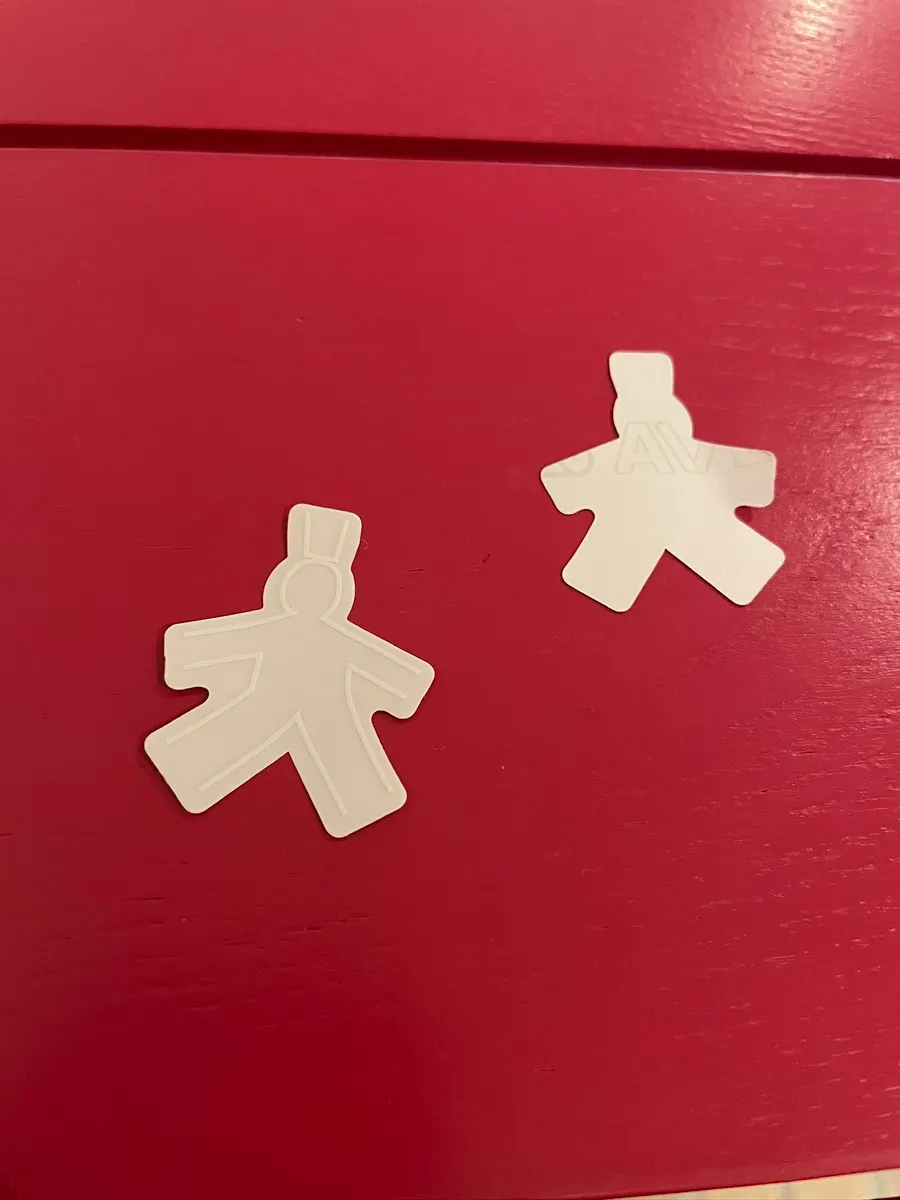 Clear sticker with T Coffee's logo at the counter