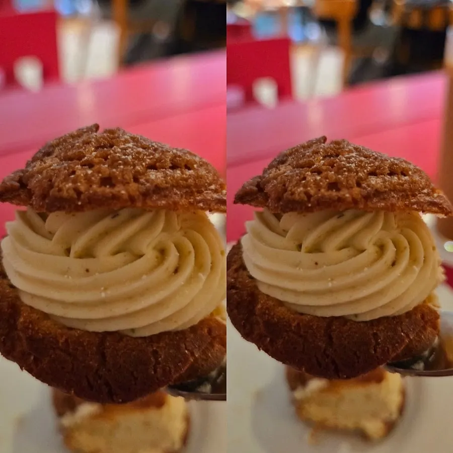 Cross-section of a bitten pistachio cream puff