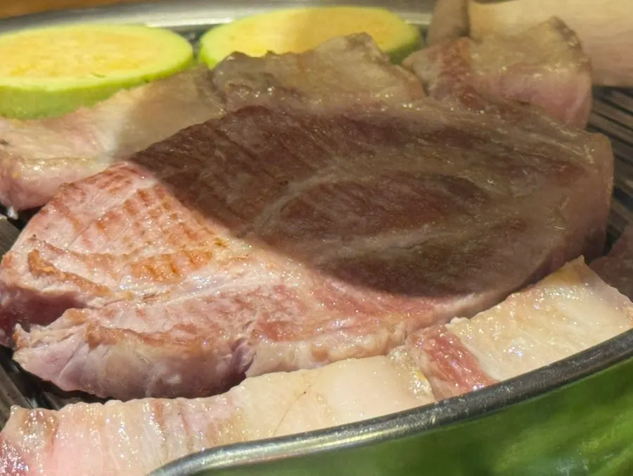 Pork belly and thick pork neck grilling together with vegetables