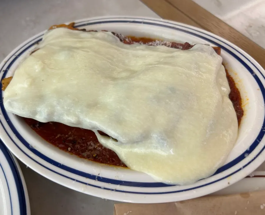Aligot cheese lasagna and octopus dish