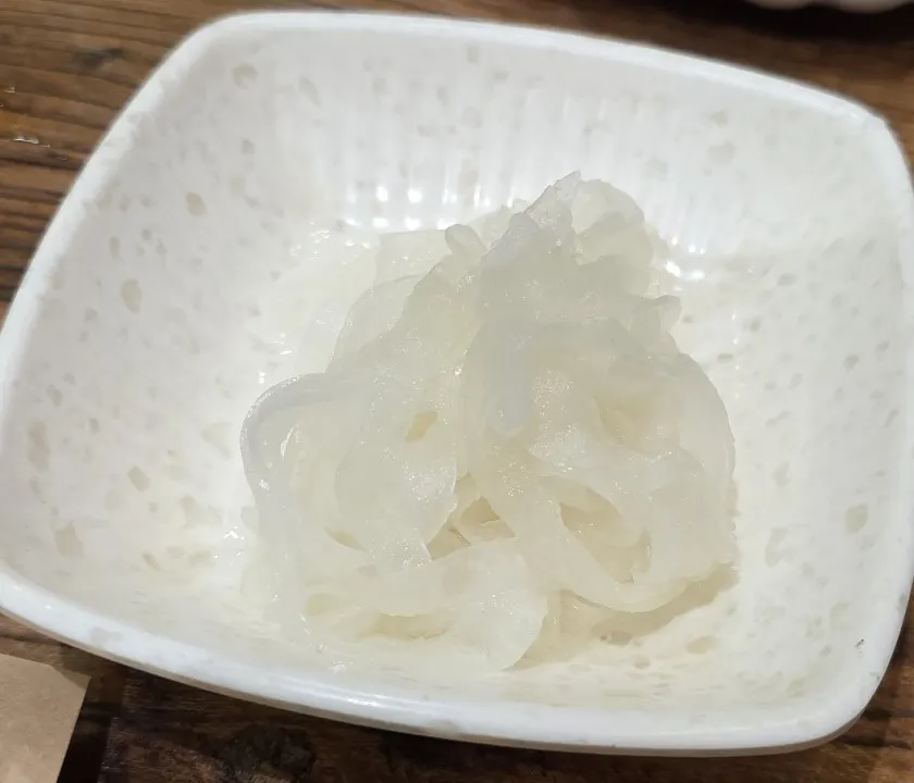 Pickled onions served with curry