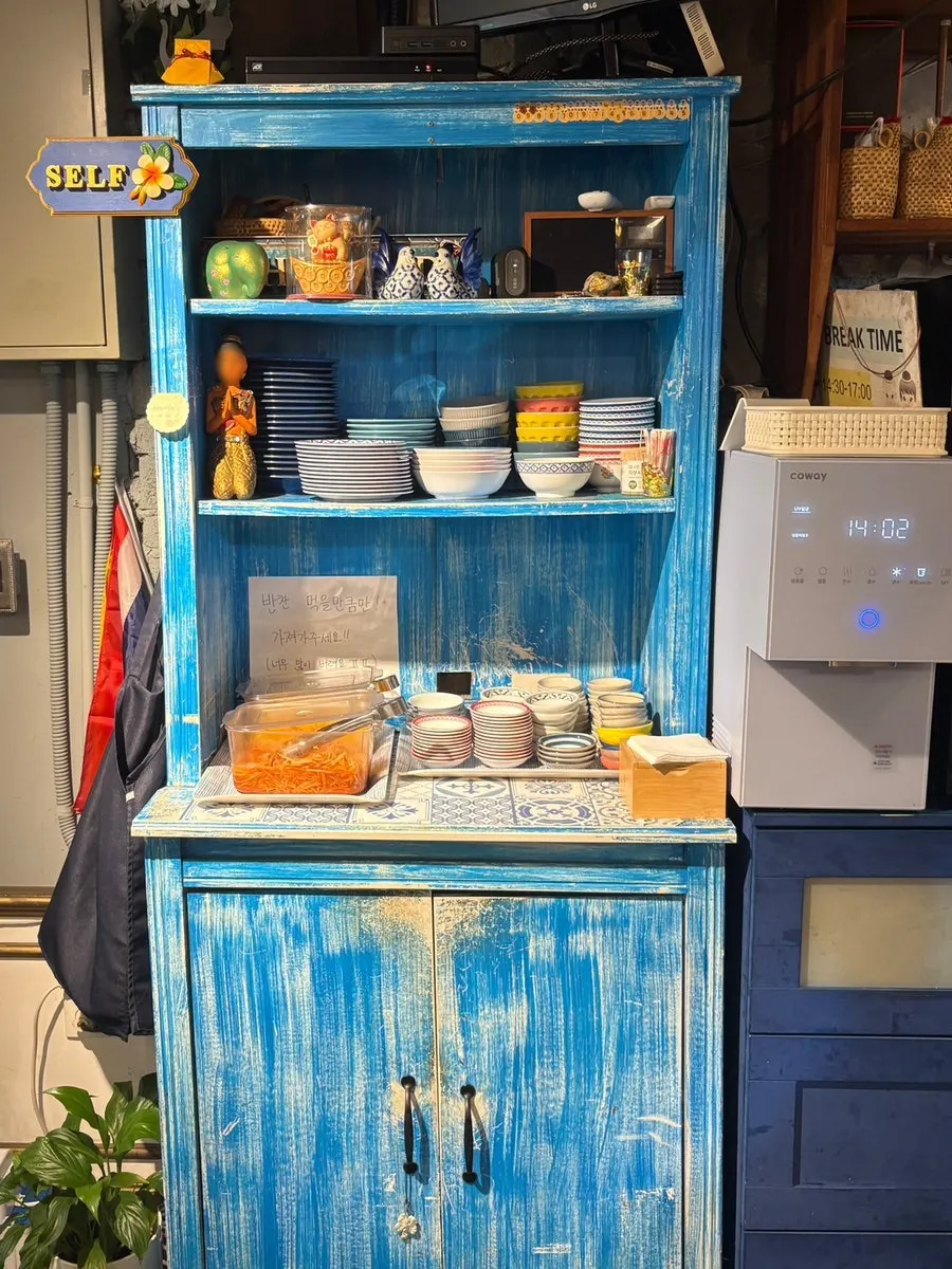 Self-serve bar with pickled radish and Thai-style shredded radish