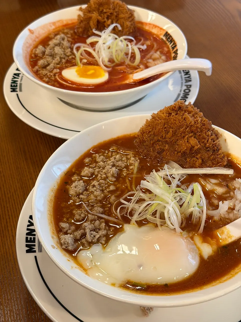 Table spread of ramen and pork katsu set ordered with friends