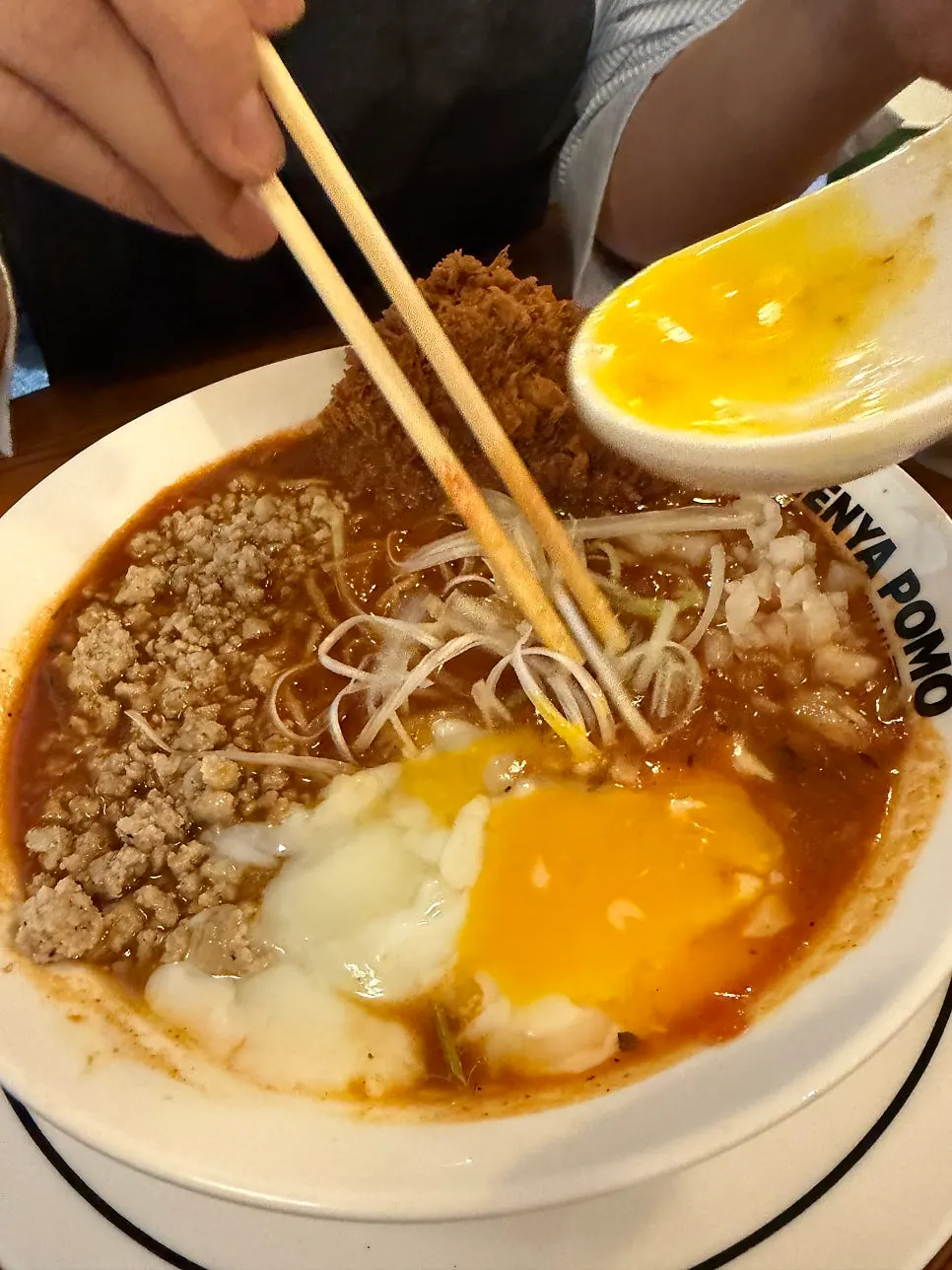 Tomato ramen topped with beef katsu