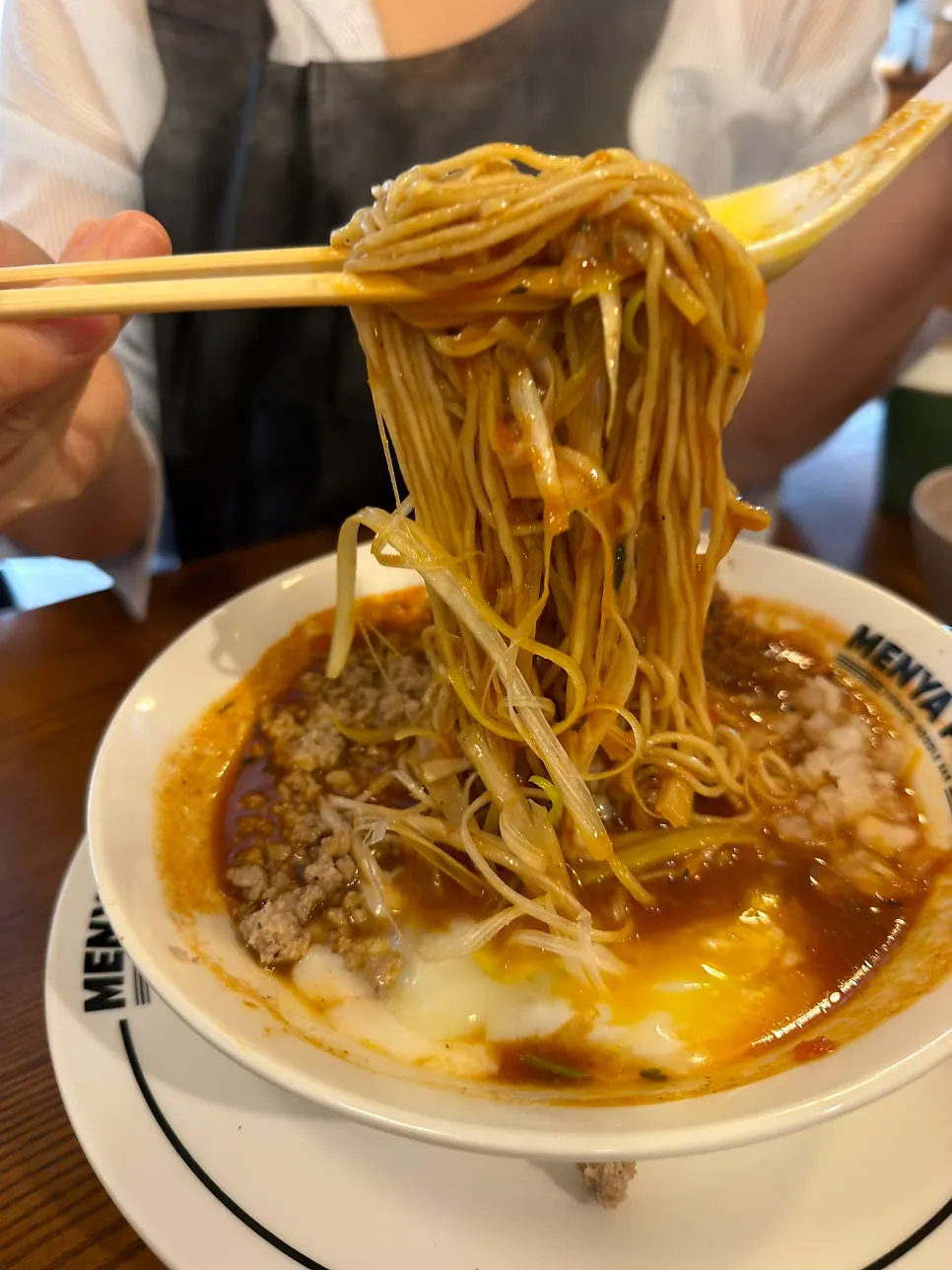 Close-up of the katsu on top of the tomato ramen
