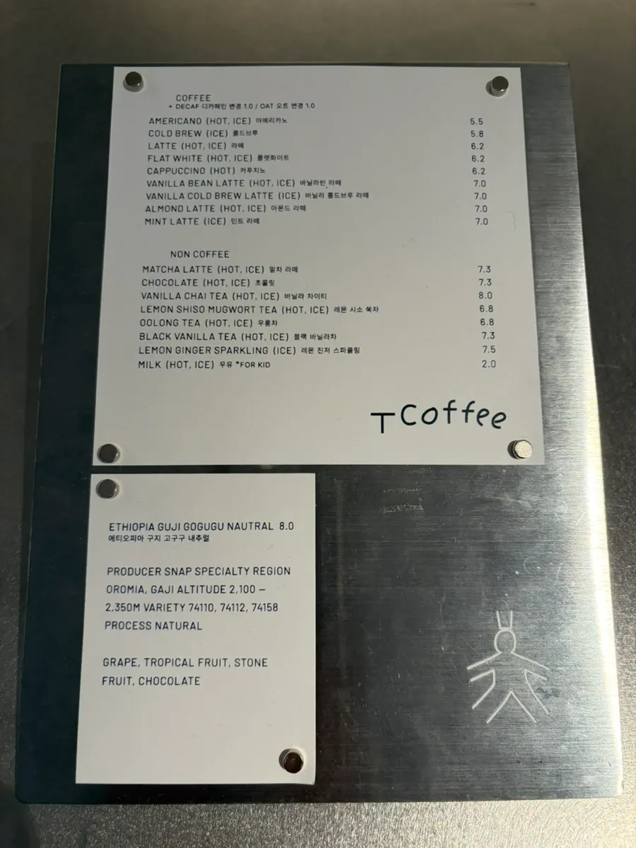 A corner seating area inside T Coffee