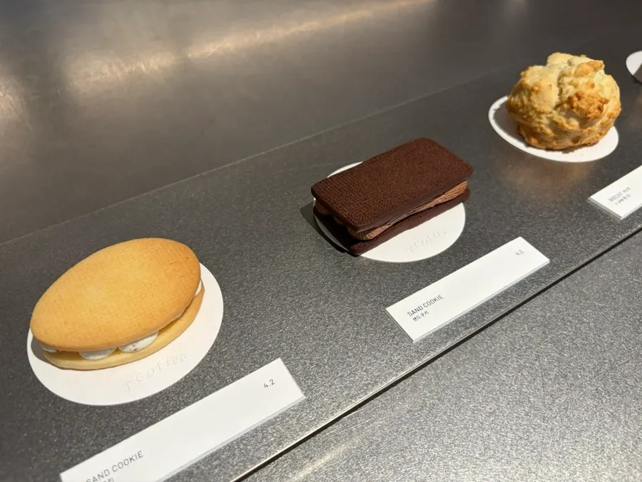 T Coffee's menu board and order booth