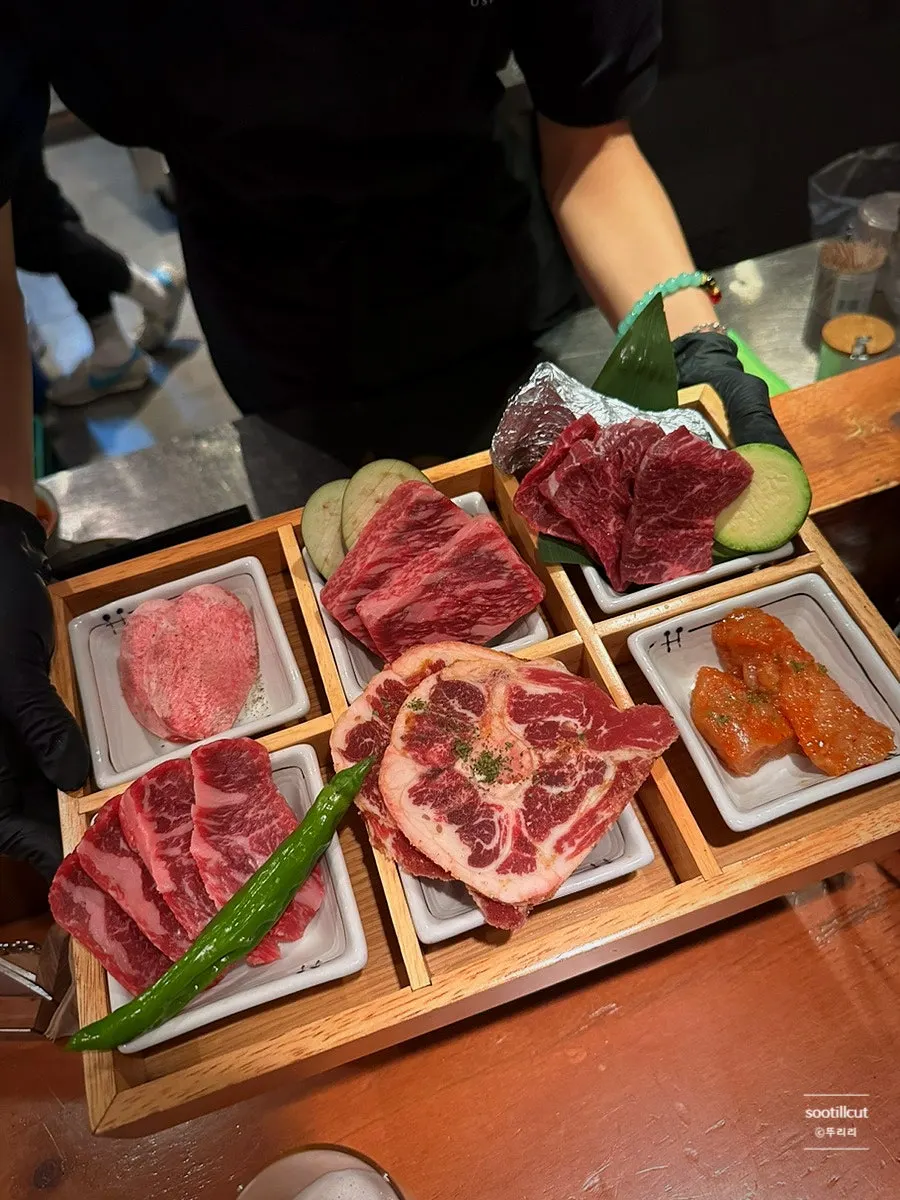 Korean beef course side dishes and sauce setting