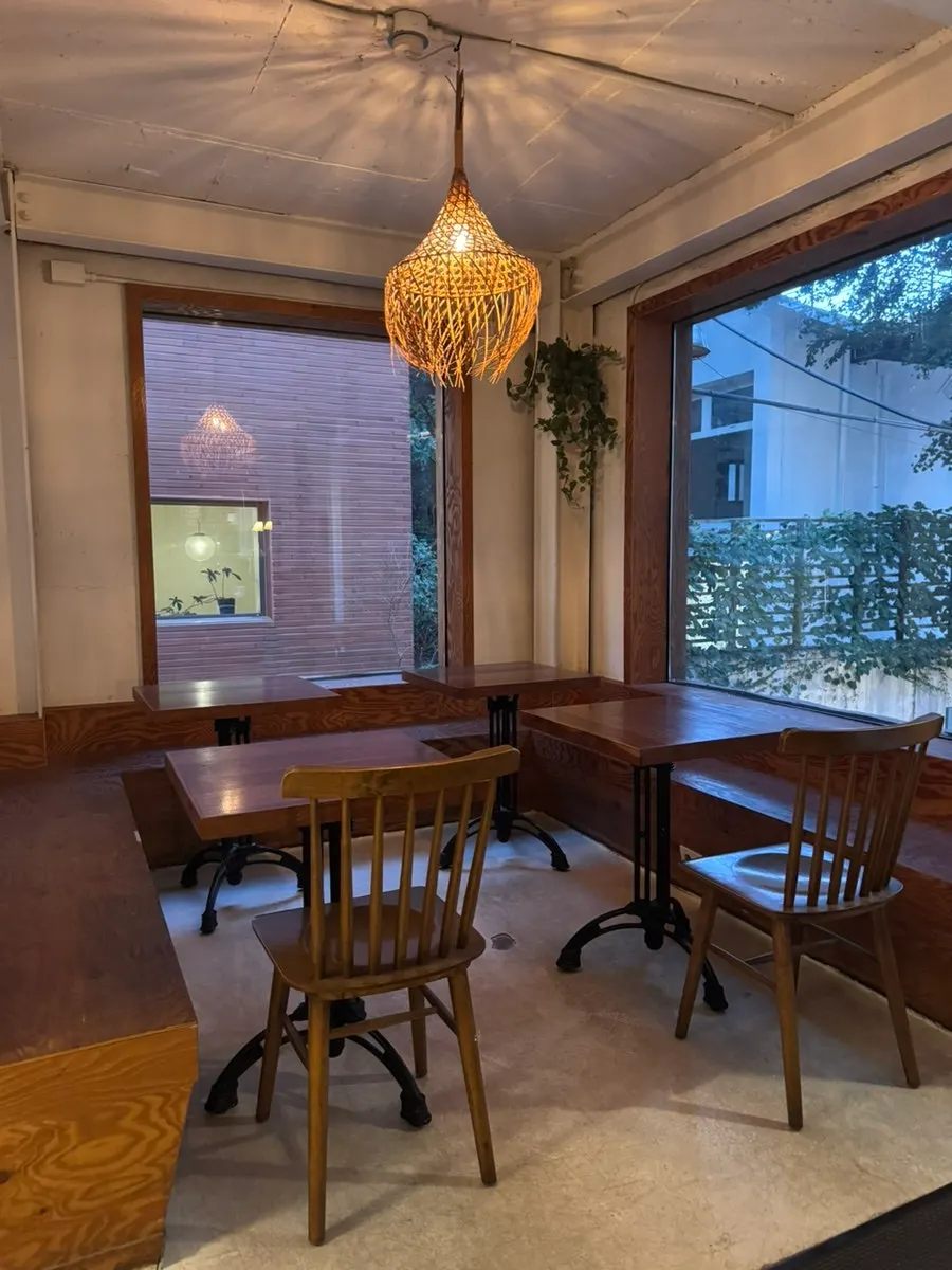 Wood-toned seating inside 5to7 Seongsu Main Branch