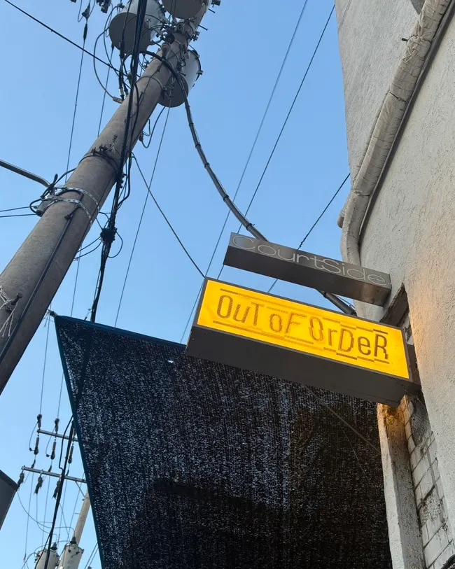 Holographic Out of Order sign
