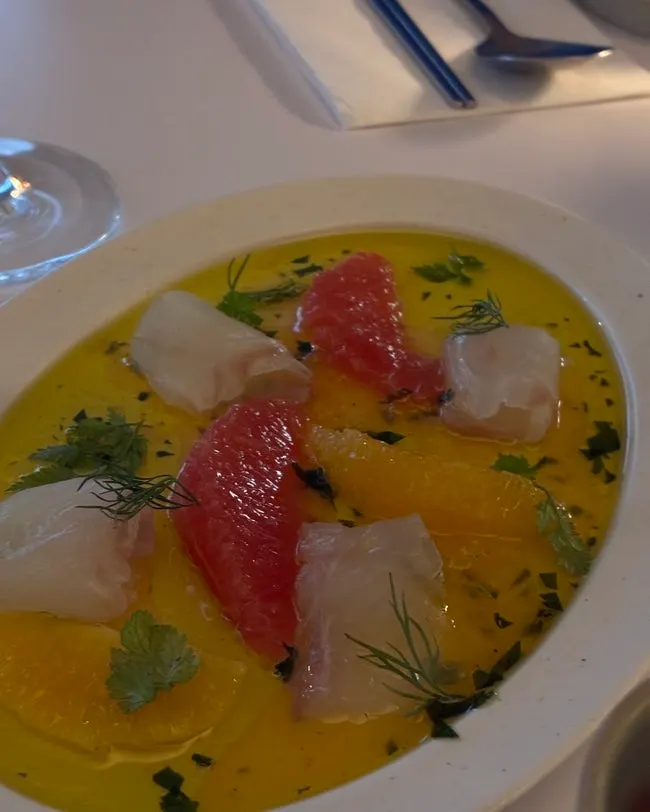 Flounder carpaccio served with an alcohol order