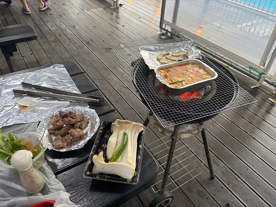Barbecue area set with charcoal and a grill