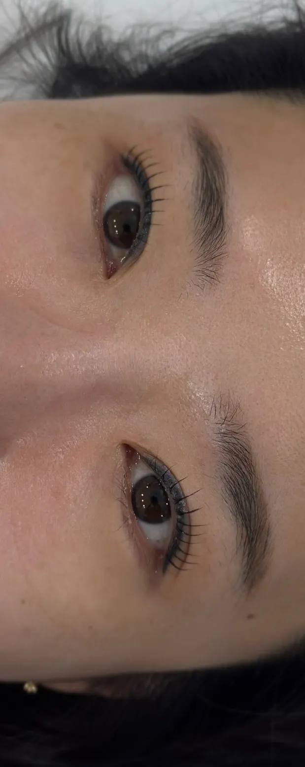 Eyes after the finished L-curl lash lift with black tinting