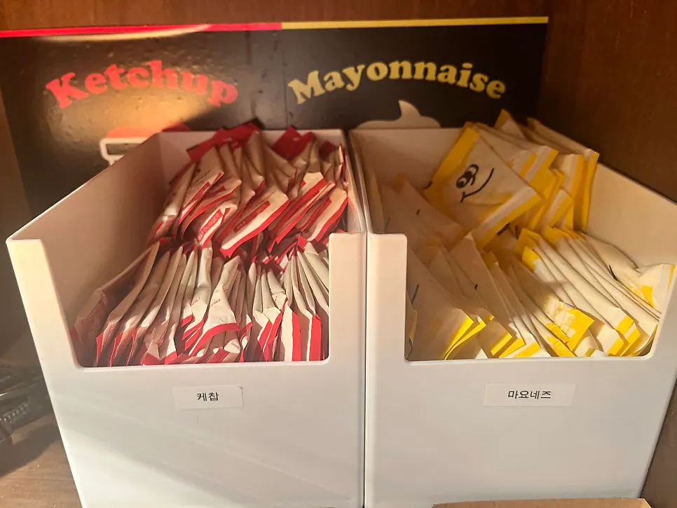Self-serve ketchup and mayo sauce station