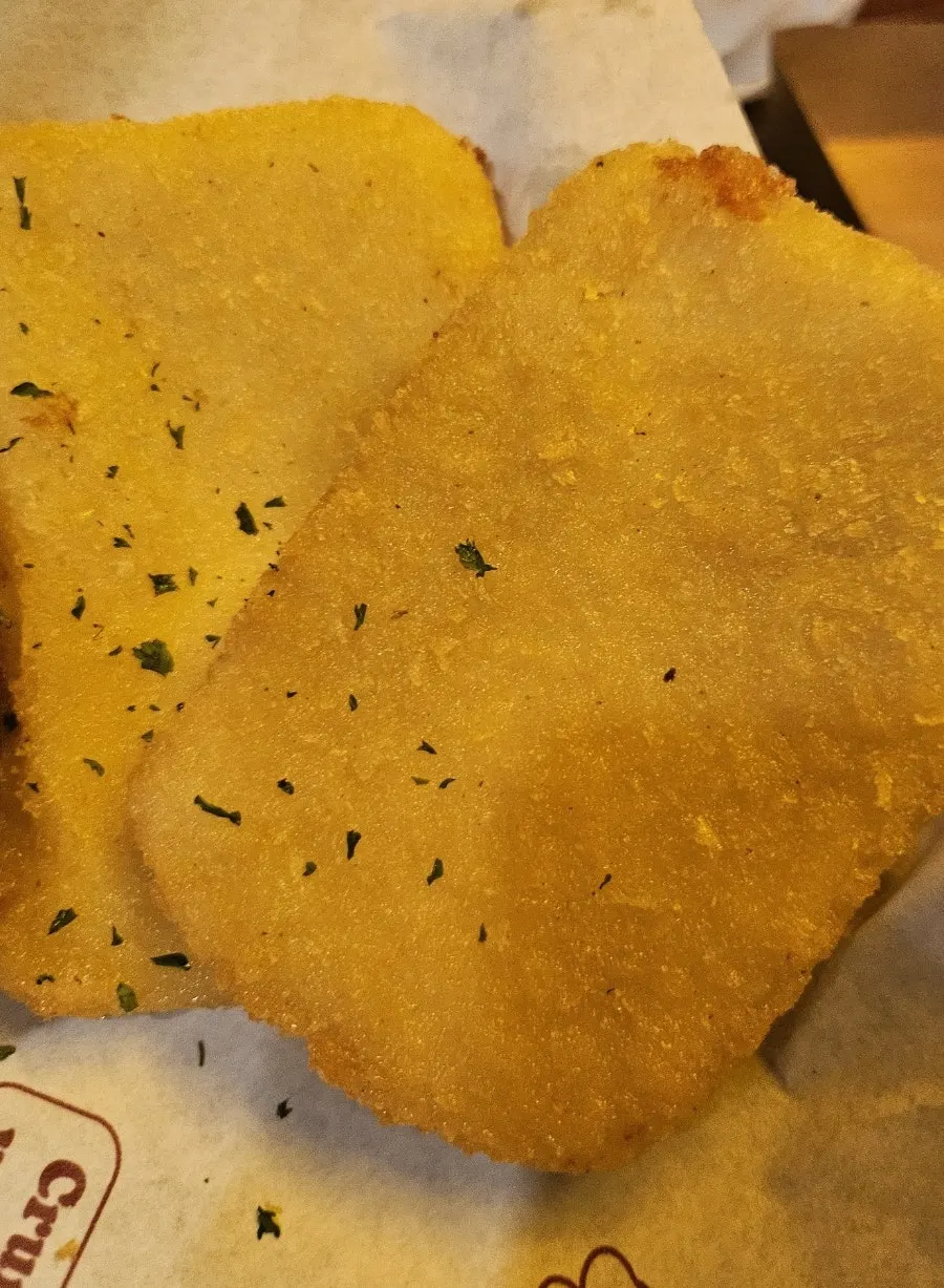 A thick, golden fried mozza cheese bar