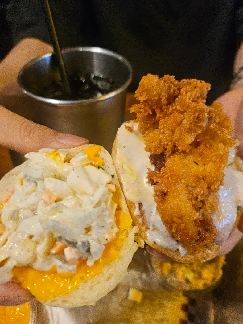 Chicken and coleslaw piled onto a mini bun