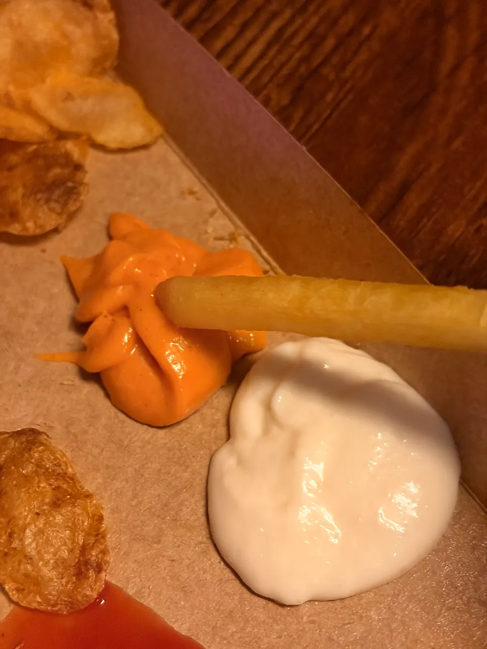 Plate of fries served with sauces