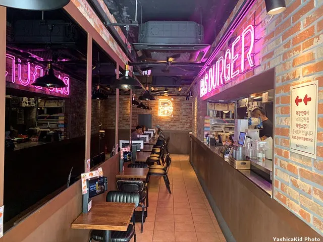 BAS Burger dining area running alongside the long kitchen