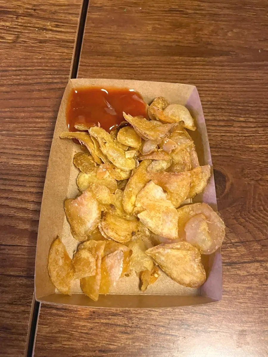 Warm fries eaten with ketchup