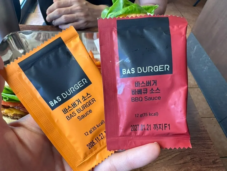 Sauce bar signage with sauce names labeled