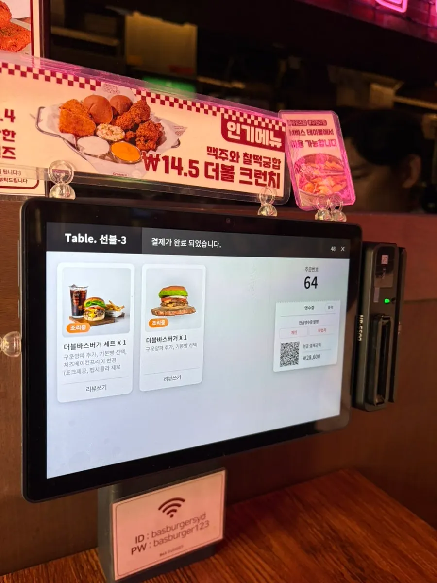 2-top and 4-top seating at BAS Burger