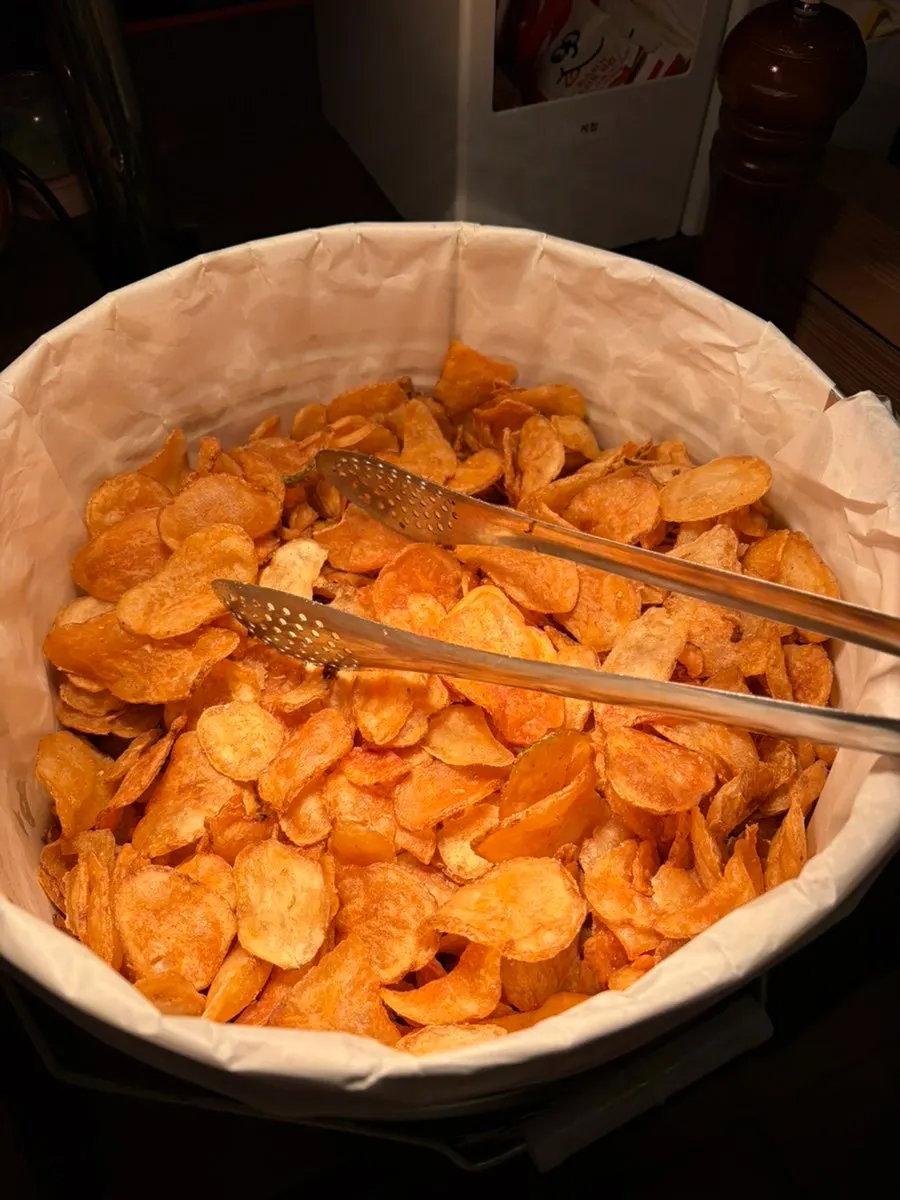 A basket of unlimited refill chips at BAS Burger