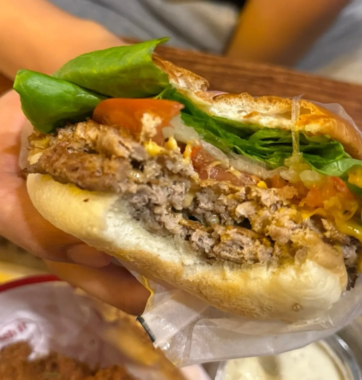 Double BAS Burger piled high with vegetables