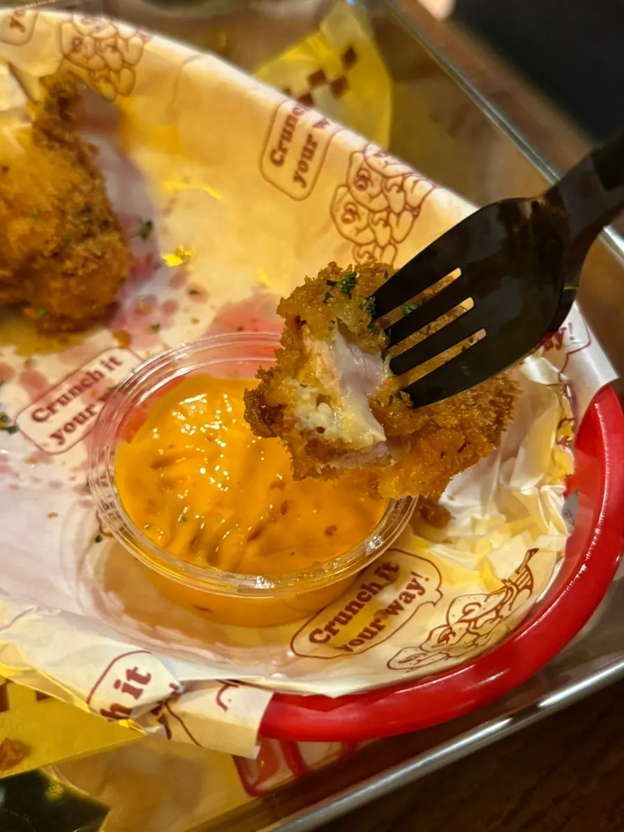 A side dipped into the Truffle Mayo Dip